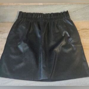 Black skirt , size Med, with pockets.